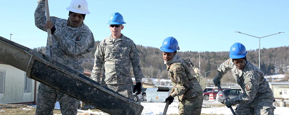 Army_MILCON_Guardsmen shoveling Cement Thumbnail