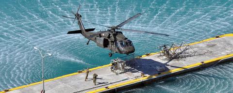 UH-60 Black Hawk hovering over water