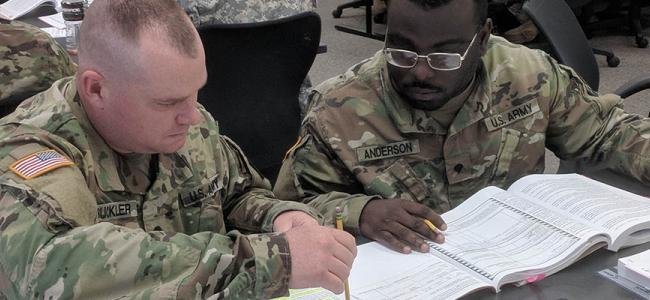 Guardsmen Studying_ARMY