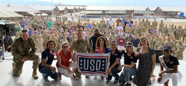 Army Command Sgt. Maj. Christopher Kepner, senior enlisted advisor to the chief of the National Guard Bureau; Toni Trucks; Sally Lengyel; Air Force Gen. Joseph Lengyel, chief, National Guard Bureau; Quinton “Rampage” Jackson; Laura Bryna; Anjelah Johnson; Cassadee Pope; Mayim Bialik; and Nia Franklin pose for a photo after a USO performance, Camp Bondsteel, Kosovo, July 4, 2019. [U.S. Army National Guard photo by Sgt. 1st Class Jim Greenhill]